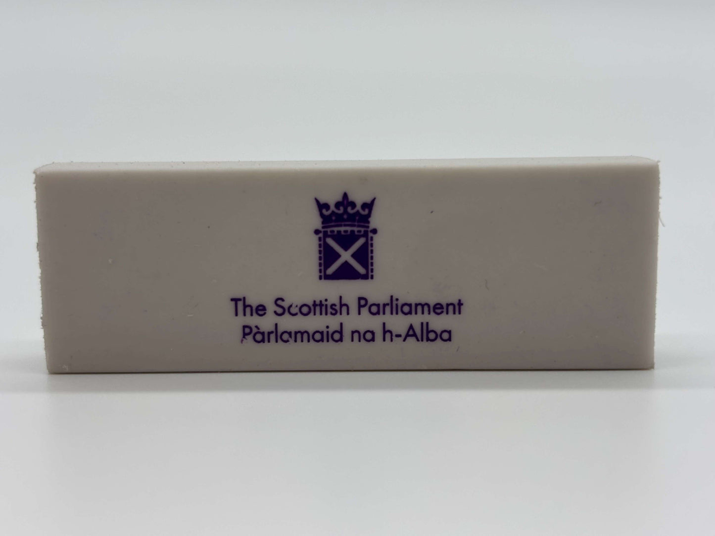 white rectangle with purple print