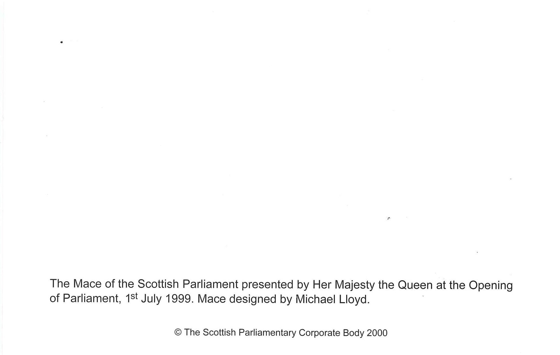 Back of the card. White with description: The Mace of the Scottish Parliament presented by Her Majesty the Queen at the Opening of Parliament, 1st July 1999. Mace designed by Michael Lloyd. 