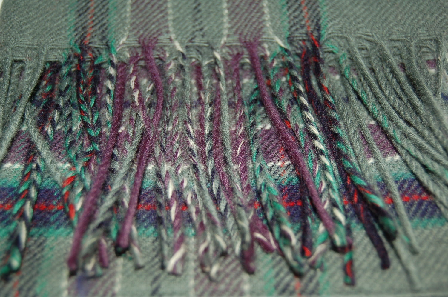 Folded scarf in Parliament tartan.