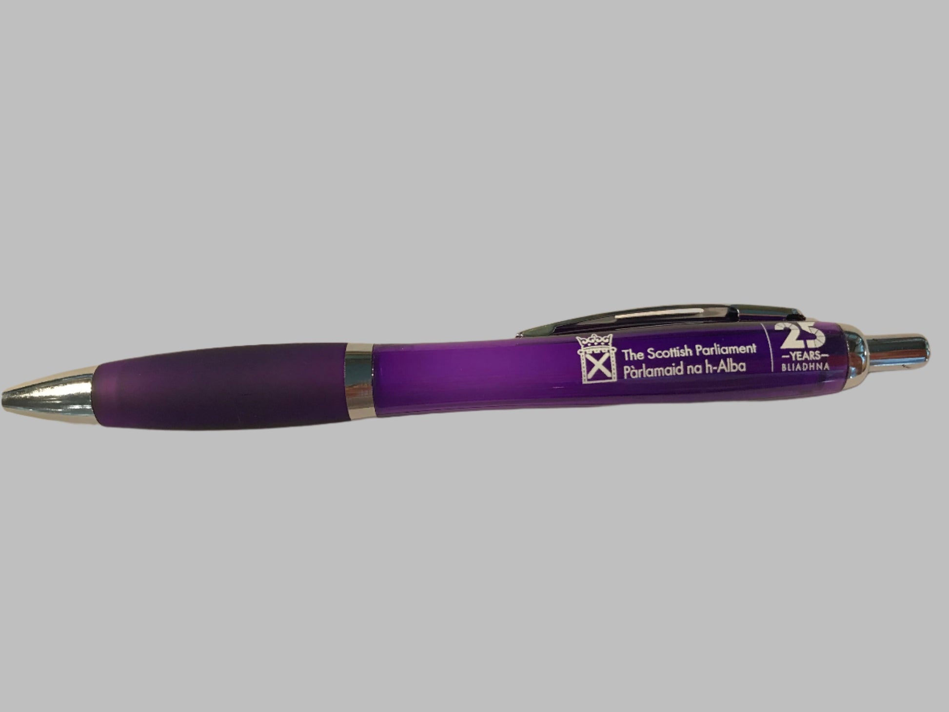 Purple pen with silver top and clip