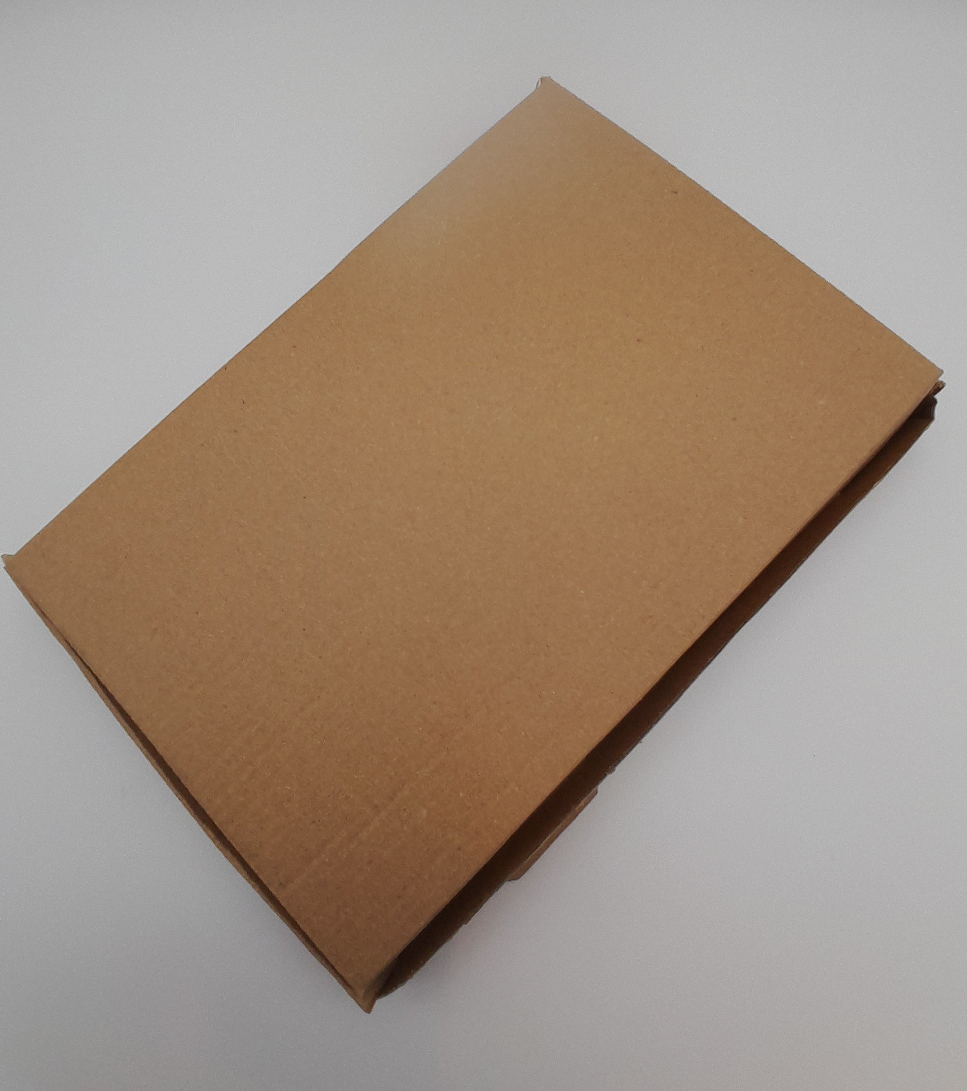 A rectangular flat cardboard box