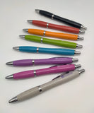 Eight pens in different colours.
