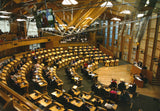 A large postcard showing the Debating Chamber.
