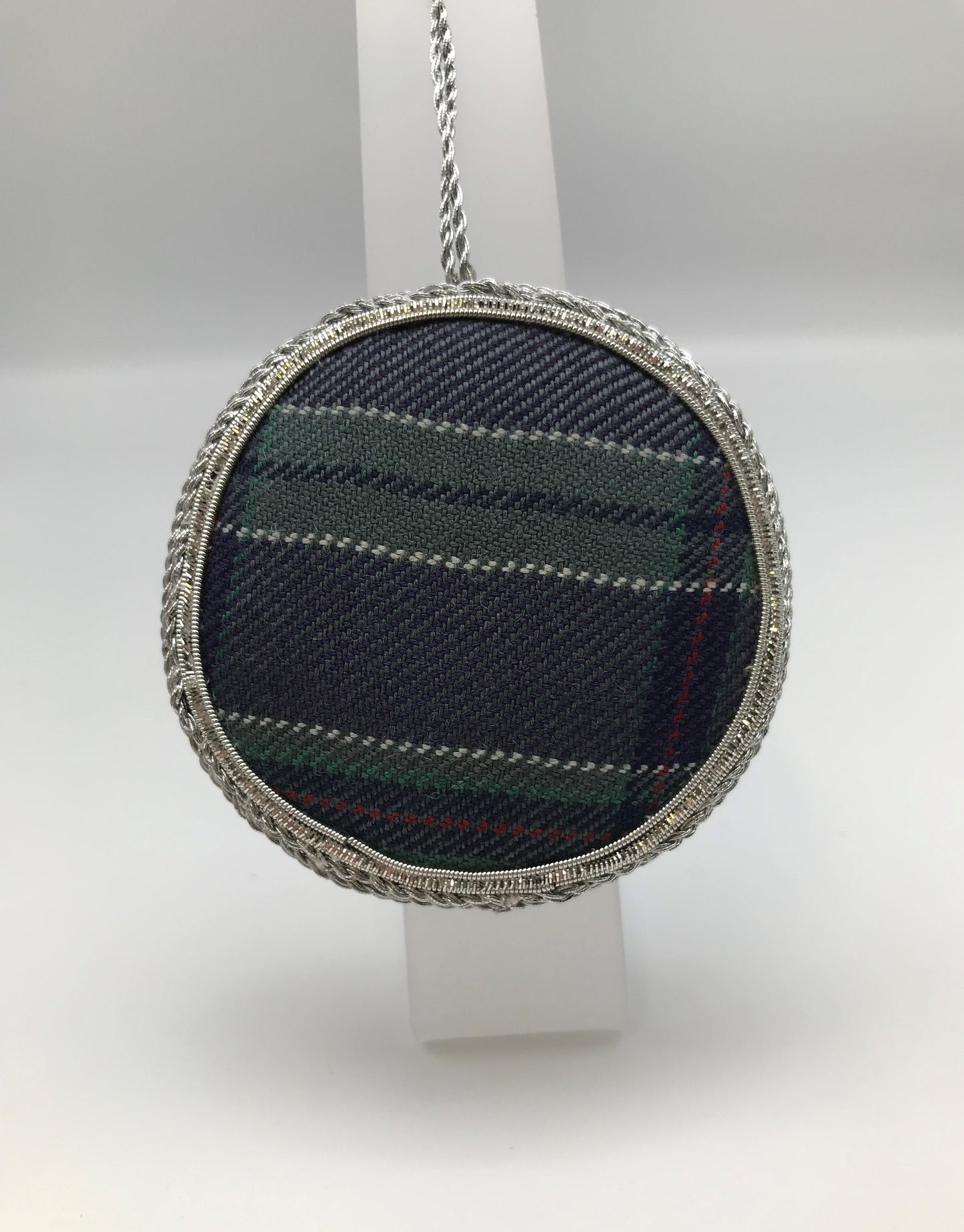 The back side of the decoration made of tartan fabric.