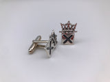 Pair of silver cufflinks featuring the crown and saltire.  Torpedo fixing