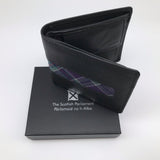 Square black wallet. Placed on black presntation box.  Lid printed with symbol of Parliament in silver