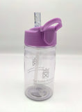 Transparent bottle tinted purple and decorated with the symbol of the Scottish Parliament. Lid is light purple with a transparent pop-up spout.