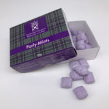 The box opened showing light purple pillow-shapedmints.