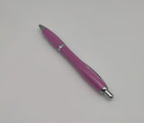 Pink pen decorated with the symbol of the Scottish Parliament with silver elements.