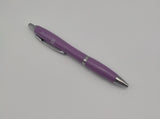 Purple pen decorated with the symbol of the Scottish Parliament with silver elements.